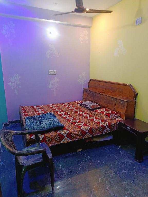 Voodi või voodid majutusasutuse Maa janki paying guest house toas