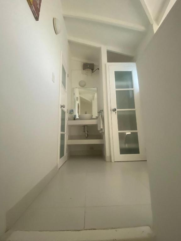 Cama ou camas em um quarto em South End Villas - Colombian Caribbean Apartments