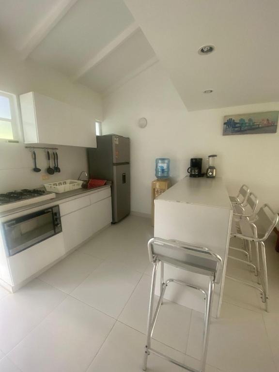 A cozinha ou cozinha compacta de South End Villas - Colombian Caribbean Apartments