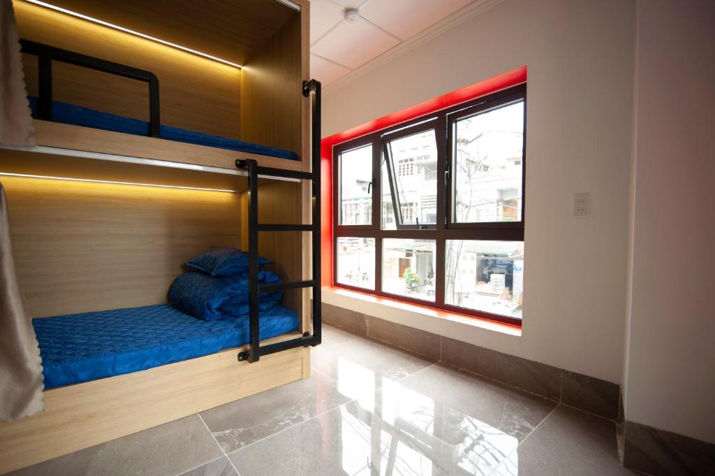Postel nebo postele na pokoji v ubytování Ma Pi Leng Horizon Hostel - Tour & Motobike rental