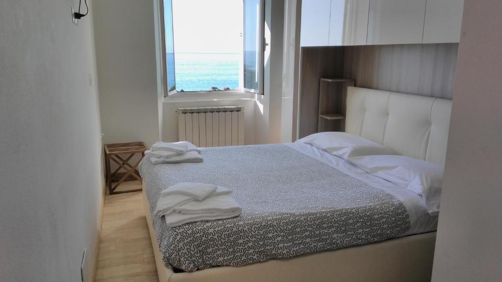 Postel nebo postele na pokoji v ubytování Hotel San Pietro Chiavari