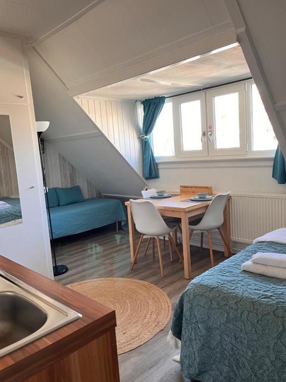Postel nebo postele na pokoji v ubytování Bed & Breakfast Hotel Zandvoort
