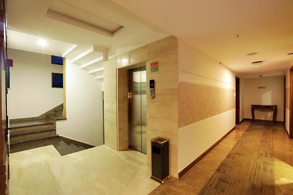 Postel nebo postele na pokoji v ubytování Hotel West Residency Delhi International Airport