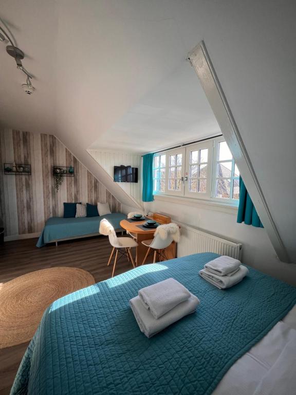 Postel nebo postele na pokoji v ubytování Bed & Breakfast Hotel Zandvoort