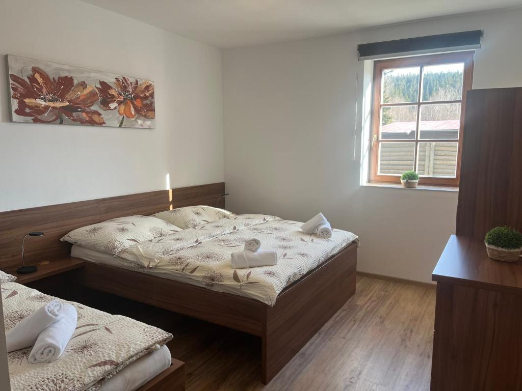 Voodi või voodid majutusasutuse Apartmány Lipka toas