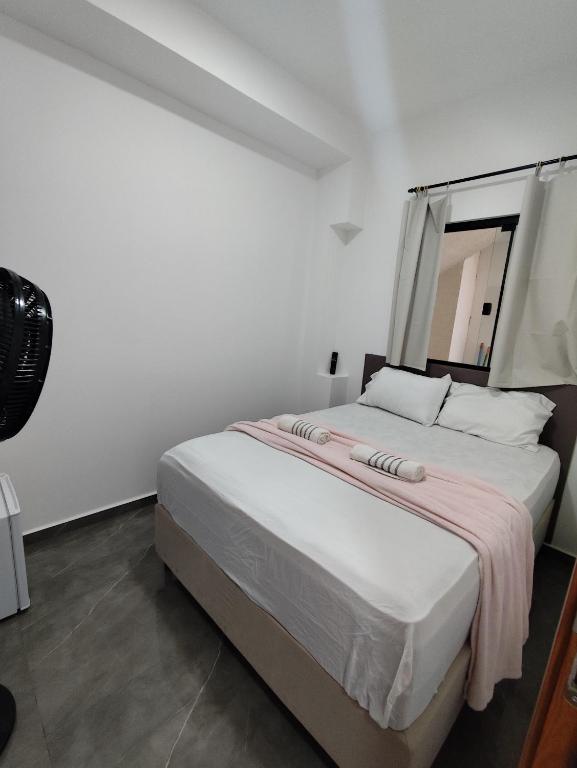 Ένα ή περισσότερα κρεβάτια σε δωμάτιο στο Suíte 16 - Pontal do Paraná