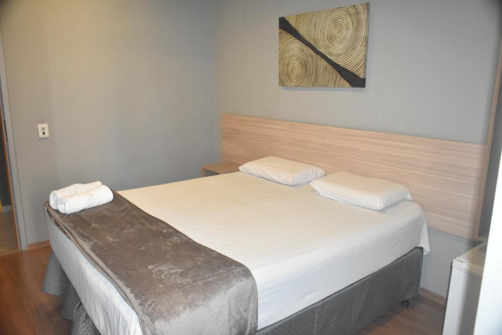 Postel nebo postele na pokoji v ubytování Unity Hotel - Campinas