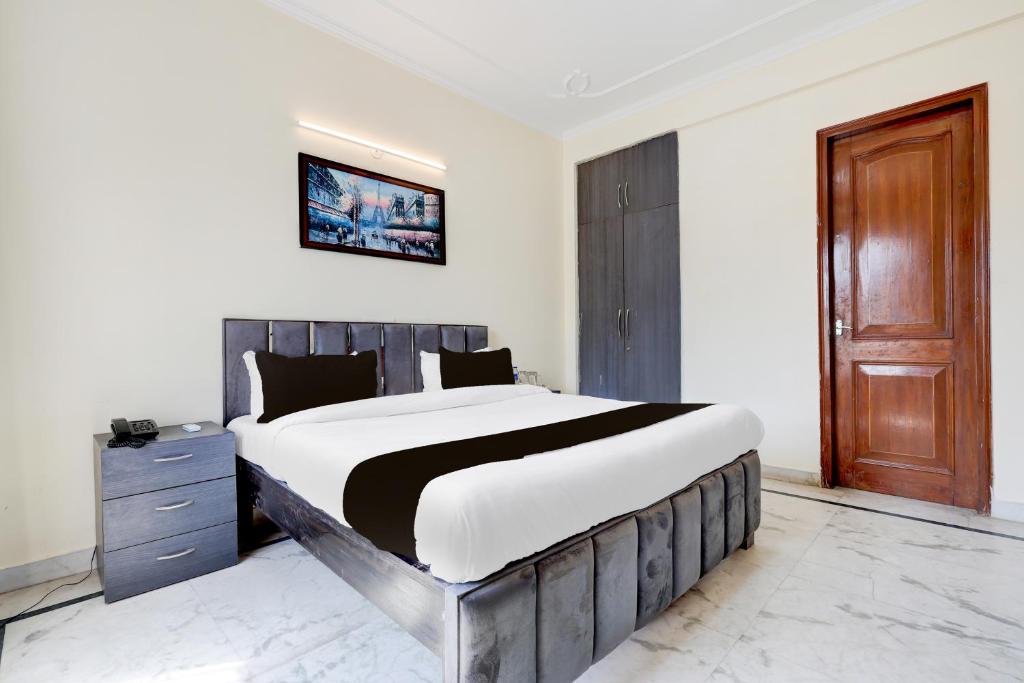 Letto o letti in una camera di Tulip Residency