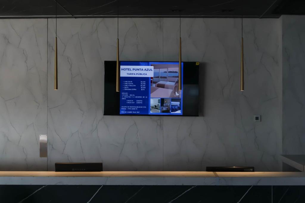 TV a/nebo společenská místnost v ubytování Hotel Punta Azul