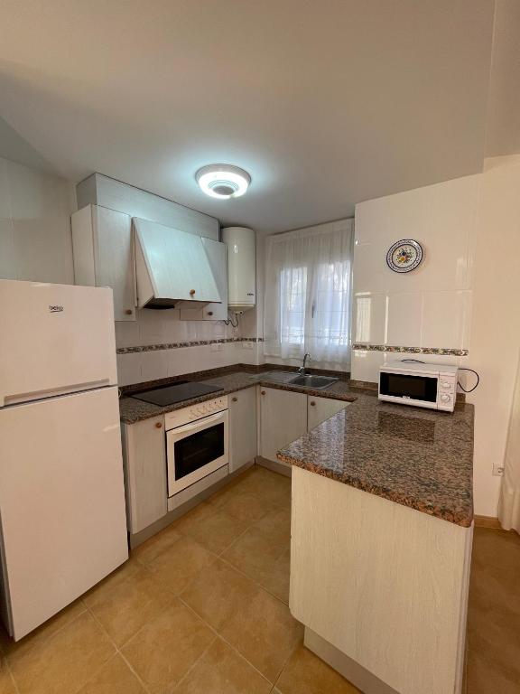 Kuchyň nebo kuchyňský kout v ubytování Alpen1 Residencial Edison