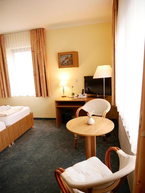 Postel nebo postele na pokoji v ubytování Hotel Waldesruh