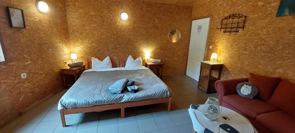 Postel nebo postele na pokoji v ubytování Chez Chou-Vrac & Ciboulette