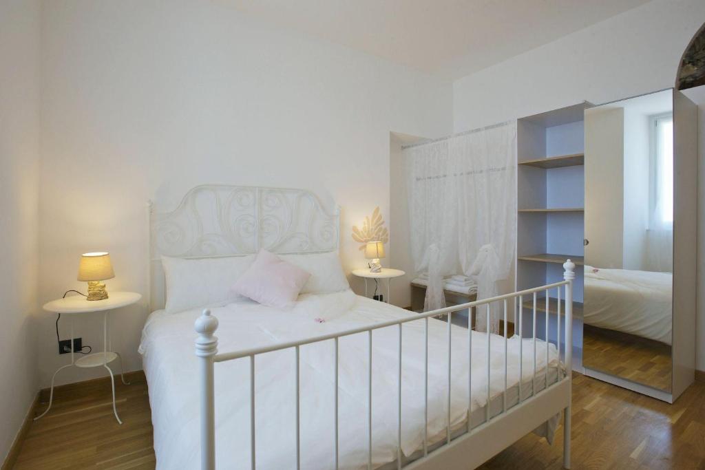 Posteľ alebo postele v izbe v ubytovaní Residence alle Ville