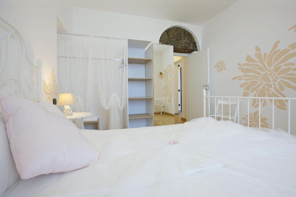 Posteľ alebo postele v izbe v ubytovaní Residence alle Ville