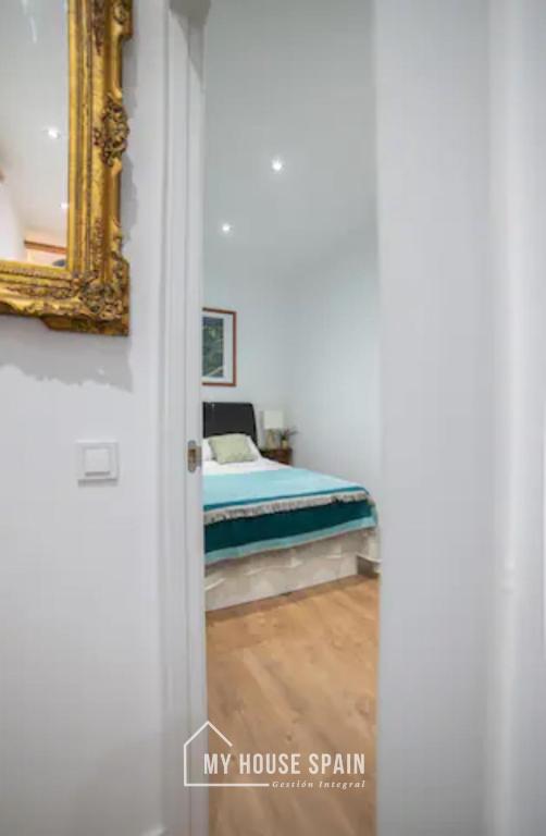 Postel nebo postele na pokoji v ubytování MyHouseSpain - Vacacional piso de lujo en Lavapiés