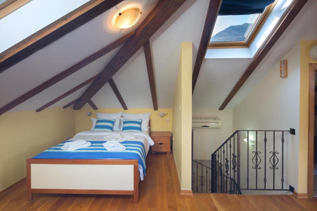 Postel nebo postele na pokoji v ubytování Villa Gina