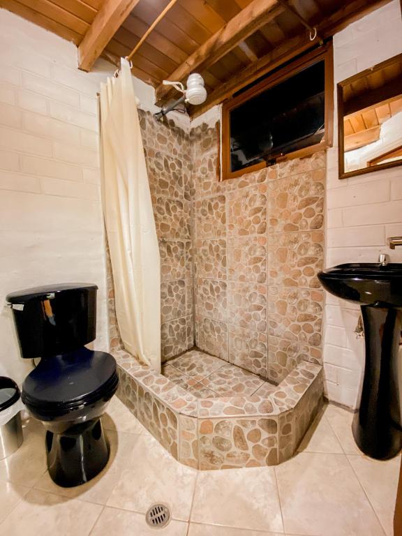 Koupelna v ubytování Chuza Longa Home