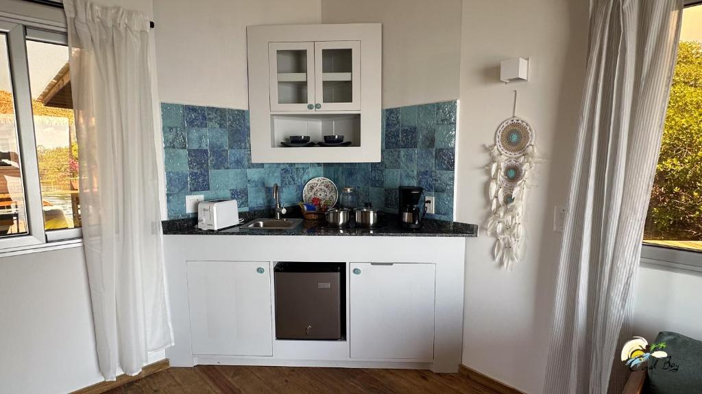 Kuchyň nebo kuchyňský kout v ubytování CoralBay Bungalows Solarte