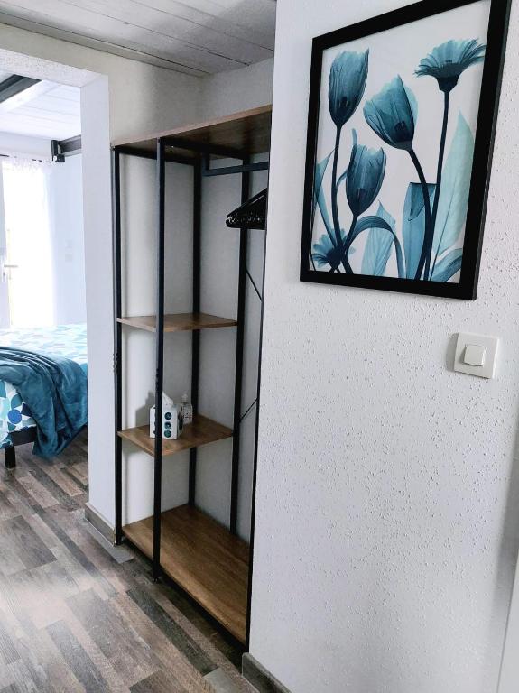 Letto o letti in una camera di Gite Au pommier fleuri et son "Appart" indépendant