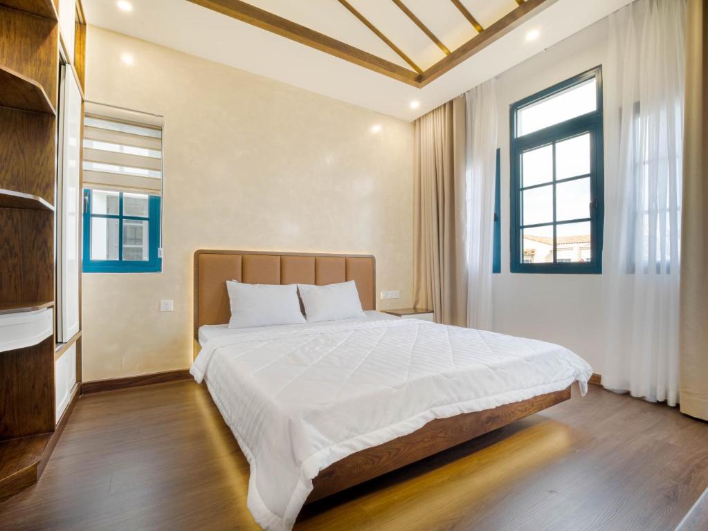 Giường trong phòng chung tại Villa LFP Novaworld Phan Thiết