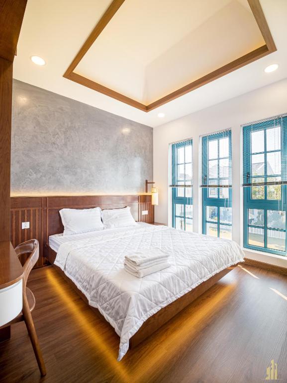 Giường trong phòng chung tại Villa LFP Novaworld Phan Thiết