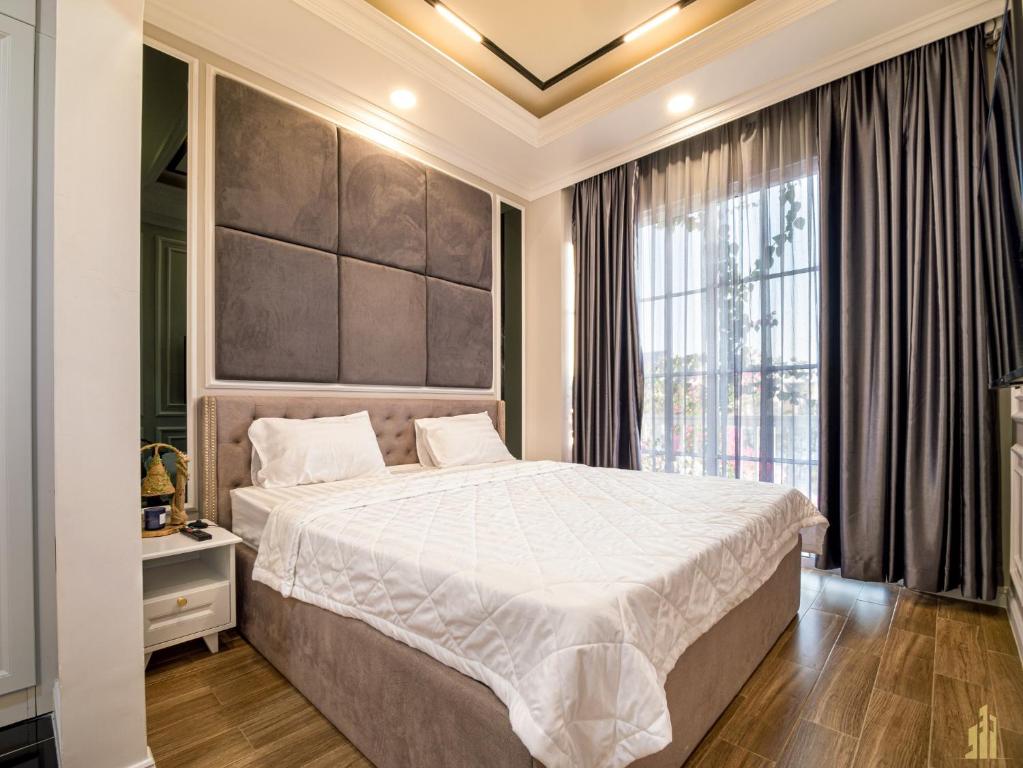 Giường trong phòng chung tại Villa LFP Novaworld Phan Thiết
