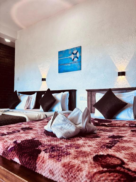Postel nebo postele na pokoji v ubytování Brisk Ella Retreat