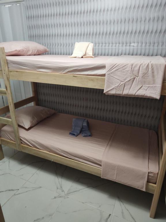 Ένα ή περισσότερα κρεβάτια σε δωμάτιο στο Casa hostel da Rô