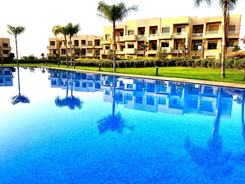 Πισίνα στο ή κοντά στο Appartement moderne à Marrakech Piscine, Jardin & fibre