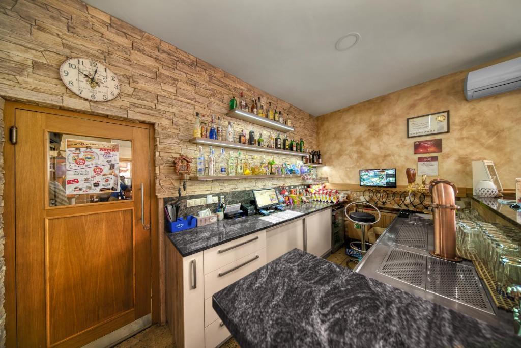 Kuchyň nebo kuchyňský kout v ubytování ANTONIO Apartments