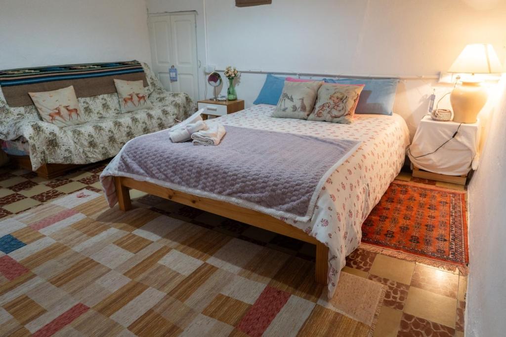 Postel nebo postele na pokoji v ubytování Masia Cal Fuster
