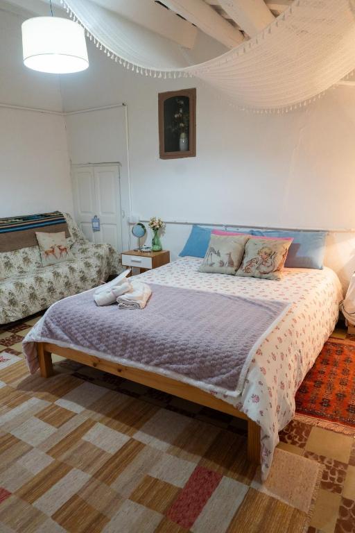 Postel nebo postele na pokoji v ubytování Masia Cal Fuster