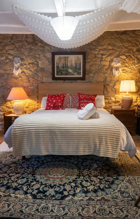 Postel nebo postele na pokoji v ubytování Masia Cal Fuster