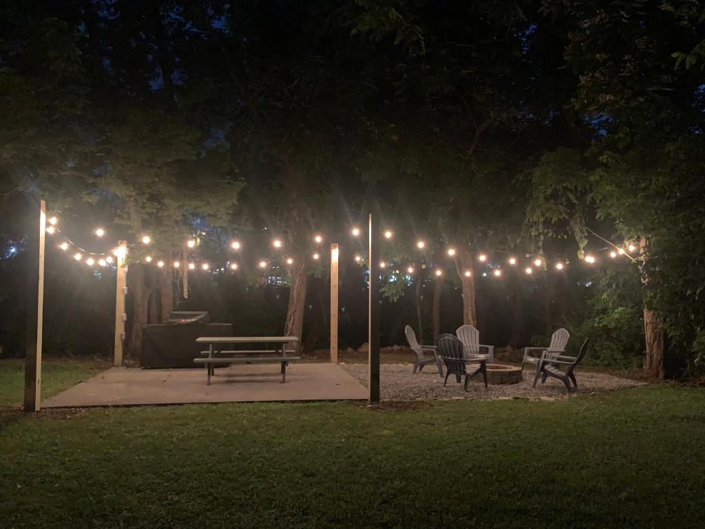 a string of lights over a park at night at River Cottage in Pigeon Forge