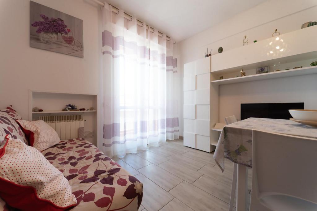 Postel nebo postele na pokoji v ubytování Viola lido adriano