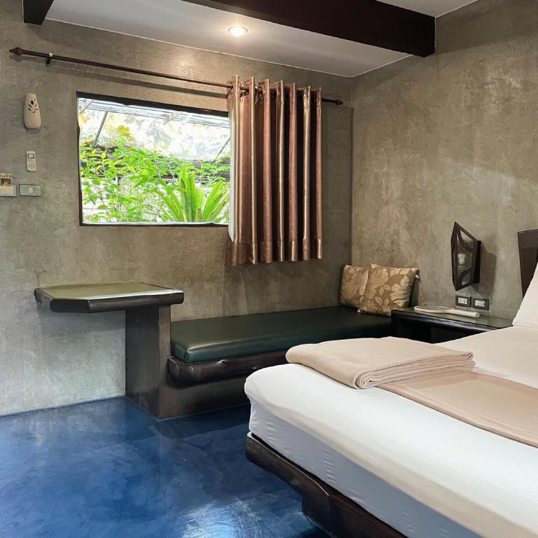 Postel nebo postele na pokoji v ubytování บ้านณัฐวรรณ หัวหิน - Baan Nattawan Huahin