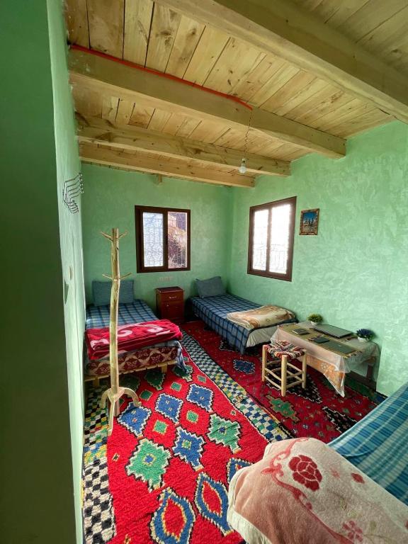 Postel nebo postele na pokoji v ubytování Dar Megdaz