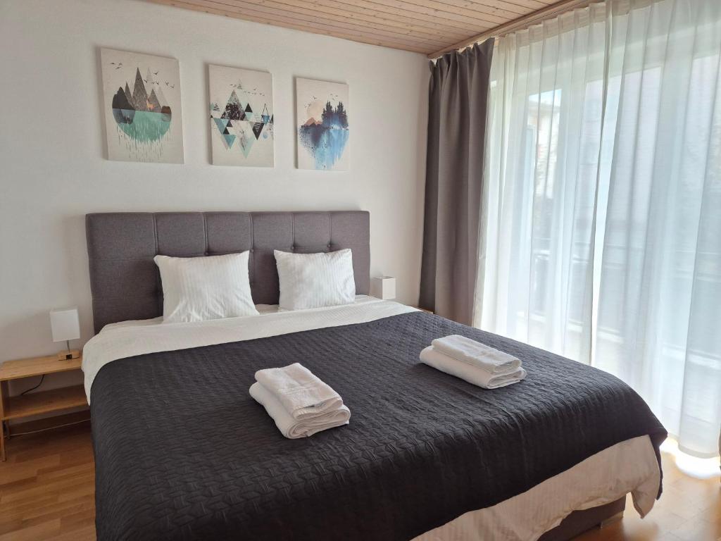 Postel nebo postele na pokoji v ubytování Apartment for 3, close to Zurich and Luzern, free private parking