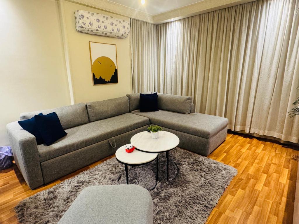Posezení v ubytování Mokattem private Condo