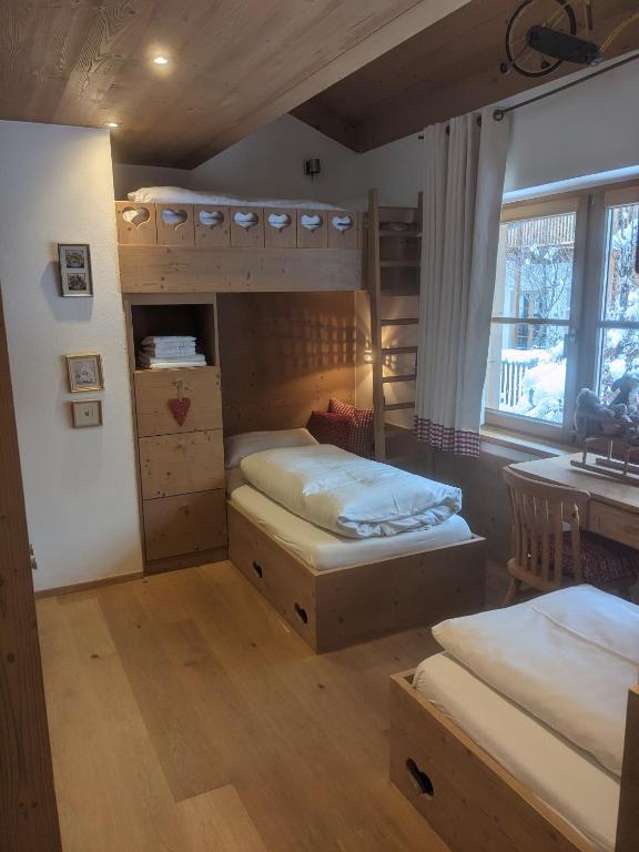 Postel nebo postele na pokoji v ubytování Clubhotel Hinterthal Am Florysee 6