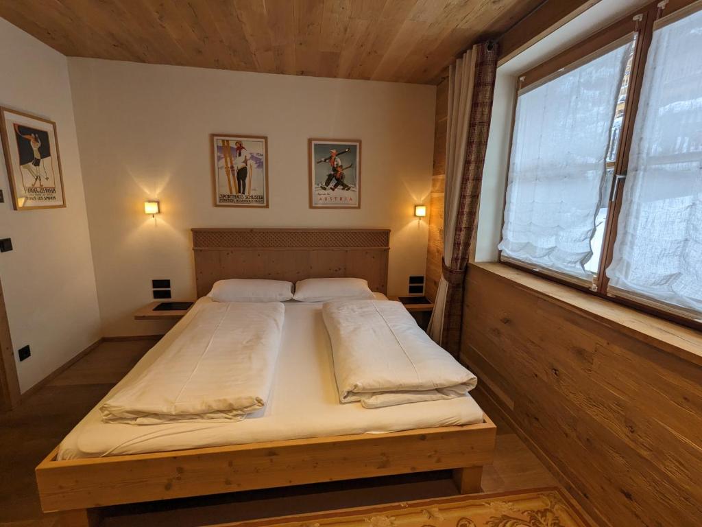 Postel nebo postele na pokoji v ubytování Clubhotel Hinterthal Am Florysee 6