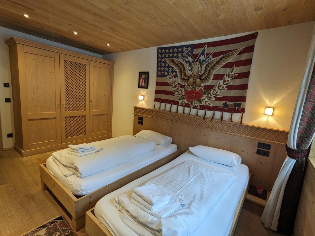 Postel nebo postele na pokoji v ubytování Clubhotel Hinterthal Am Florysee 6