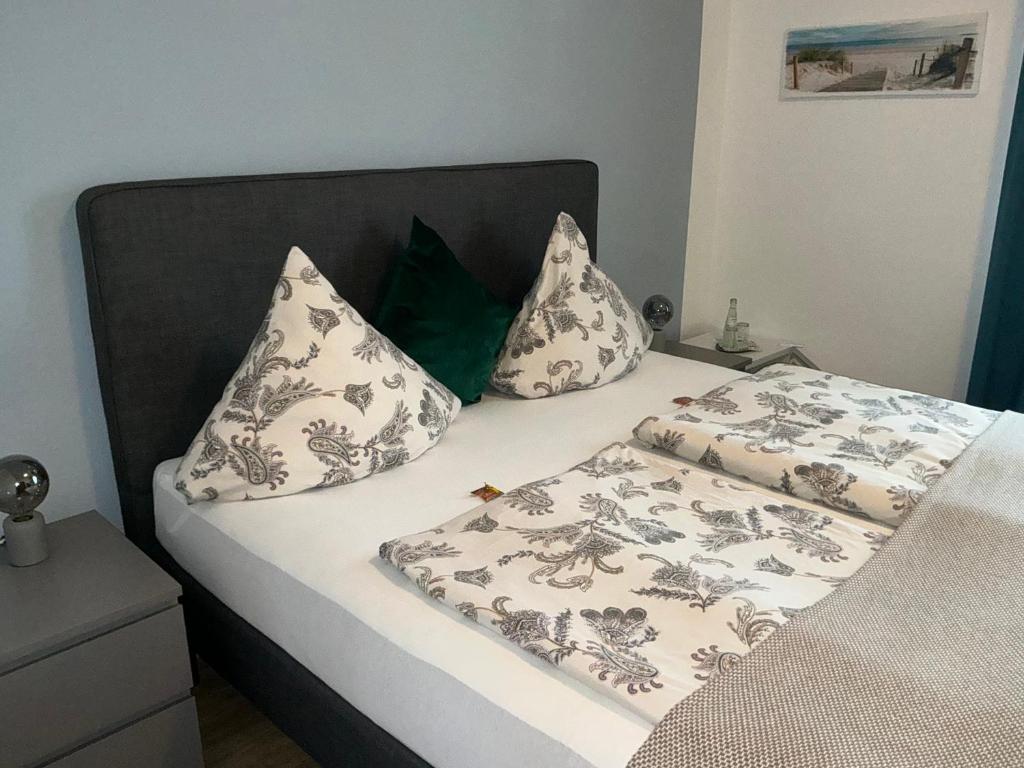 Postel nebo postele na pokoji v ubytování Baltic Stuben Hotel Garni Travemünde