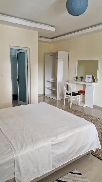Postel nebo postele na pokoji v ubytování Residencial Ru-B