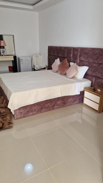Postel nebo postele na pokoji v ubytování Residencial Ru-B