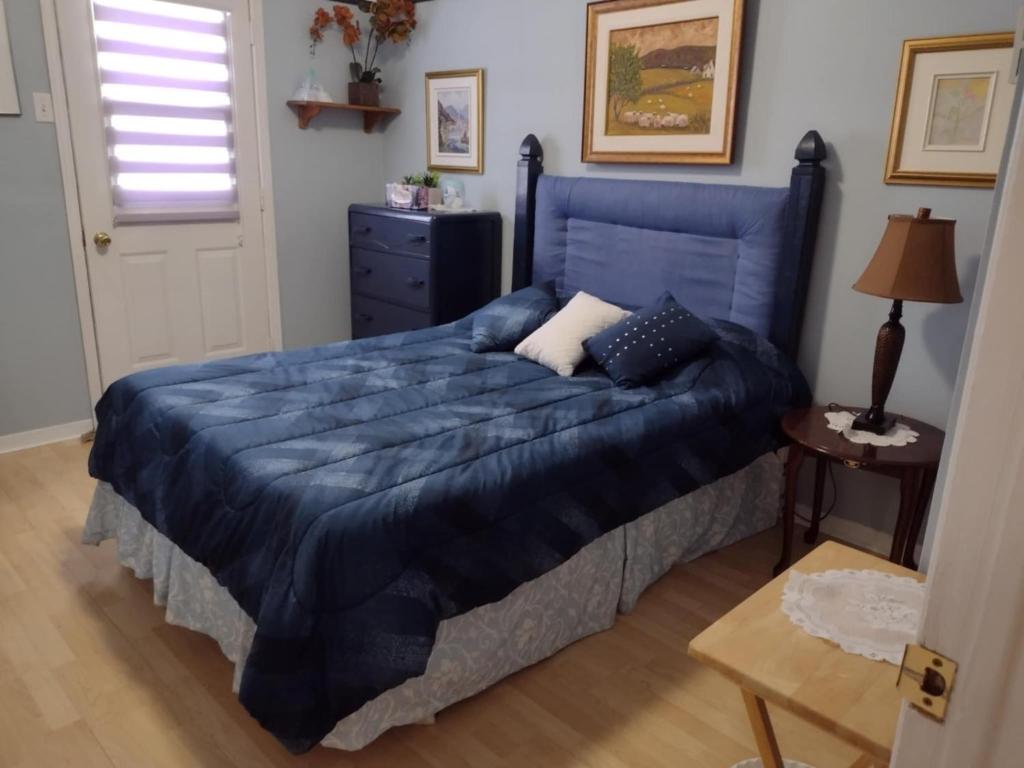 Uma cama ou camas num quarto em Gîte Marie-Claire
