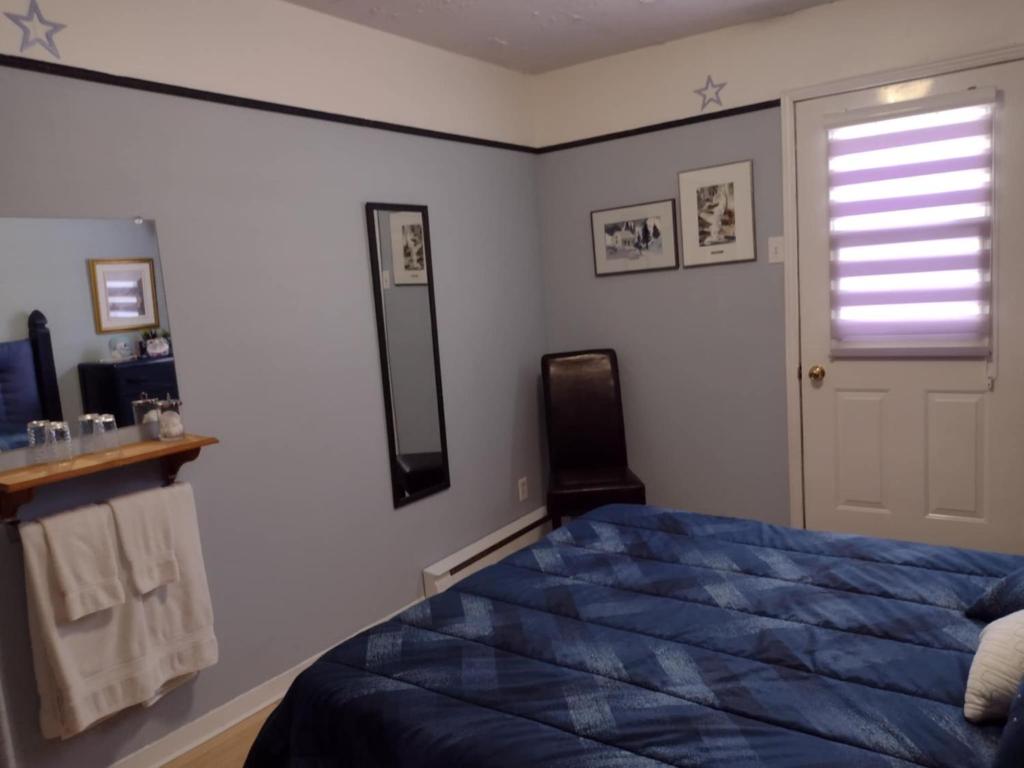 Uma cama ou camas num quarto em Gîte Marie-Claire