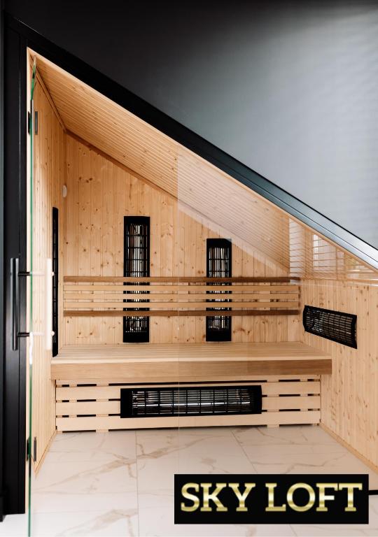 a view of a room with a skylot sign at GOLDEN HAUS Opole - SkyLOFT & MiniLOFT in Opole