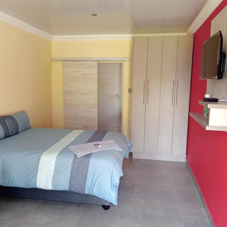 Postel nebo postele na pokoji v ubytování TSM Guesthouse