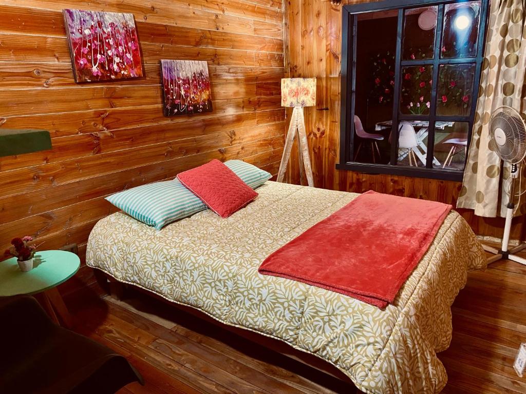 Postel nebo postele na pokoji v ubytování Hostal María Lucía
